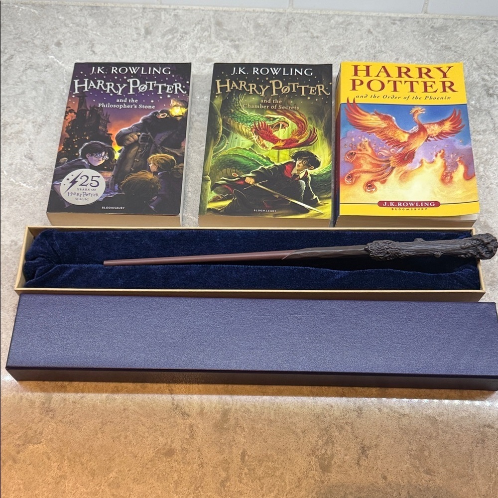 Lot of Harry Potter Books Plus Wizard wand in box J.K. Rowling. Like New!